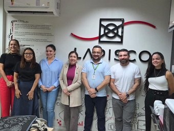 Equipe gestora da pós-graduação durante visita - Divulgação
